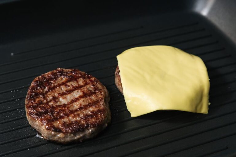 A burger with melted cheese