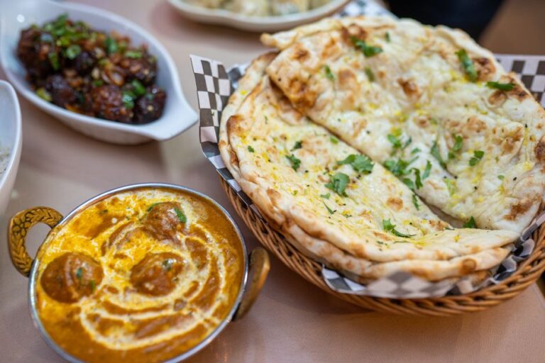 A spread of Indian dishes on a table