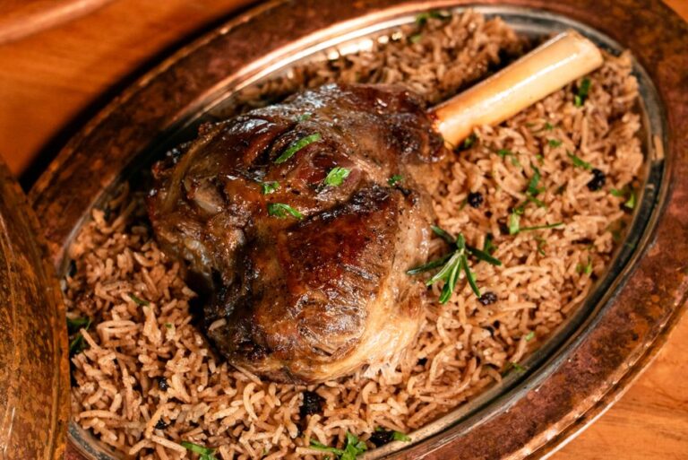 Slow-cooked lamb over rice